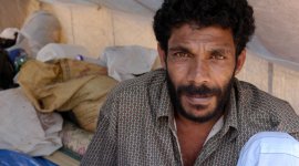 Sri Lankan man in a makeshift tent