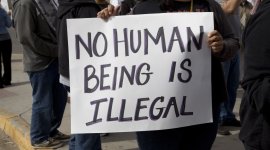 No human being is illegal banner