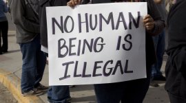 No human being is illegal banner