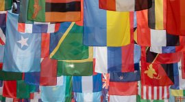 flags of the world hanging from the ceiling