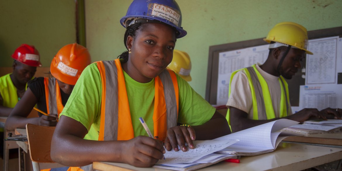 construction worker woman in classroom