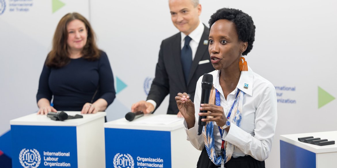 Melissa Kyeyune makes her pitch during the Innovation Scouts event presented by ITCILO Director Christophe Perrin and ILO Deputy Director-General Celeste Drake at the ILC