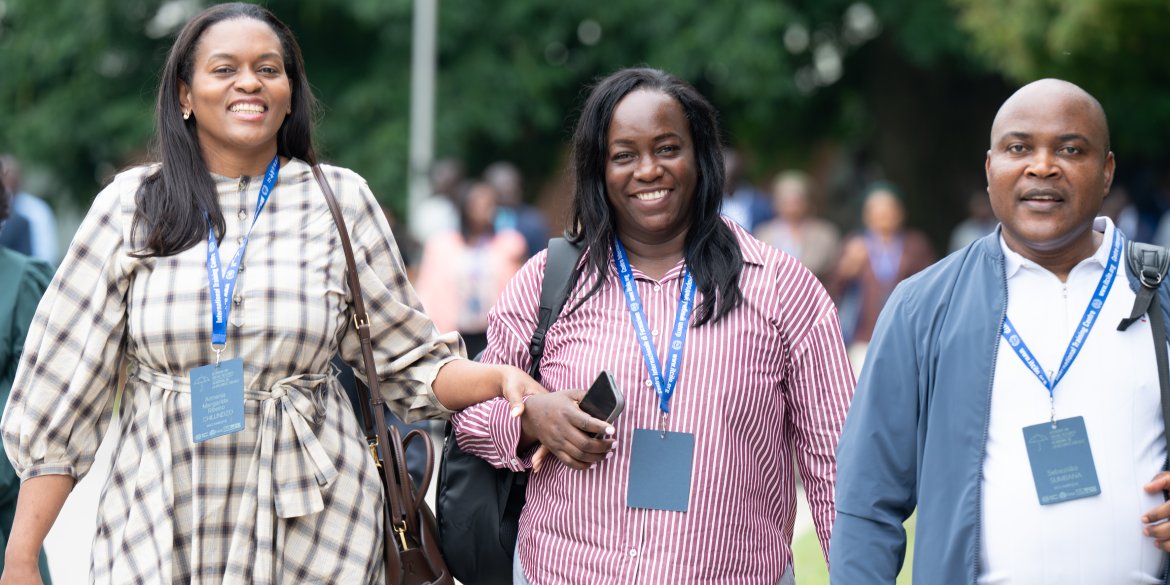 three people walking