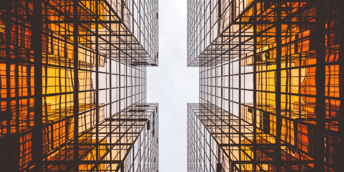 Two skyscrapers seen from below