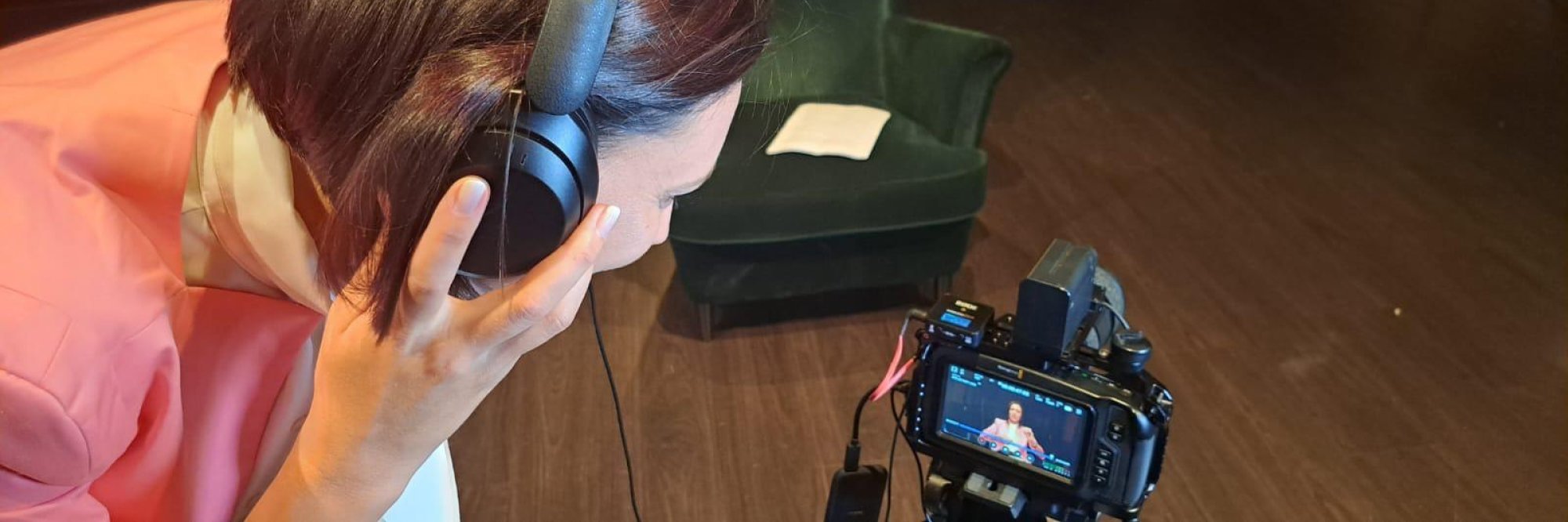 woman looking at camera with headphones