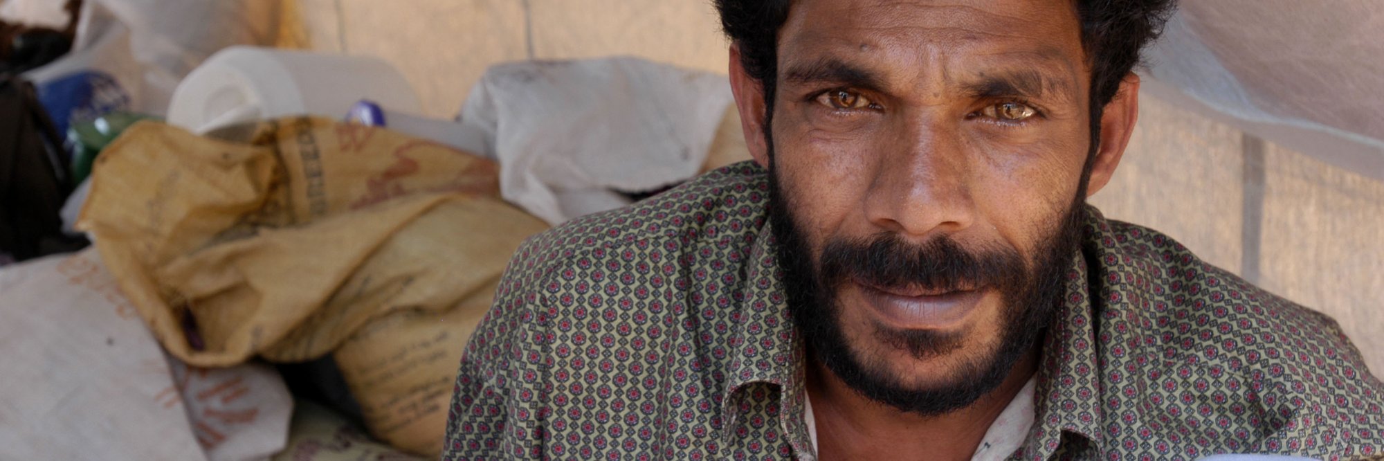 Sri Lankan man in a makeshift tent