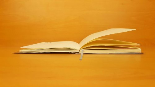 booklet on orange background