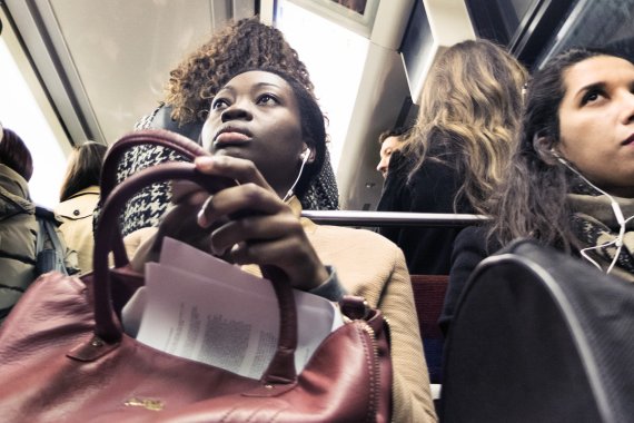 woman riding the metro in paris