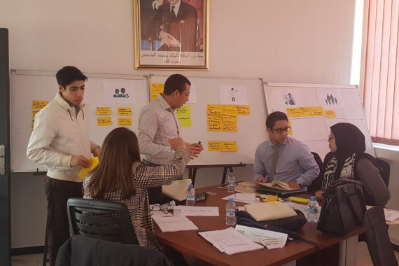 Group of participants around table