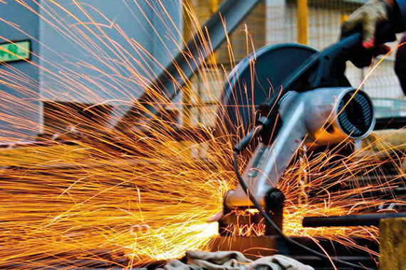 A man using a welding torch 