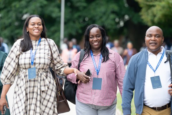 three people walking