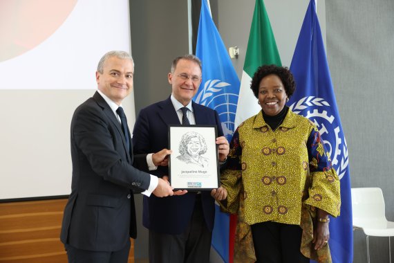 Jaqueline Mugo gets awarded by Christophe Perrin and Edmondo Cirielli