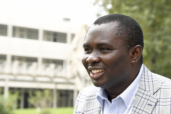  A male participant from Ghana smiling outside the ITCILO.