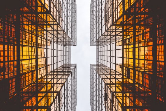 Two skyscrapers seen from below