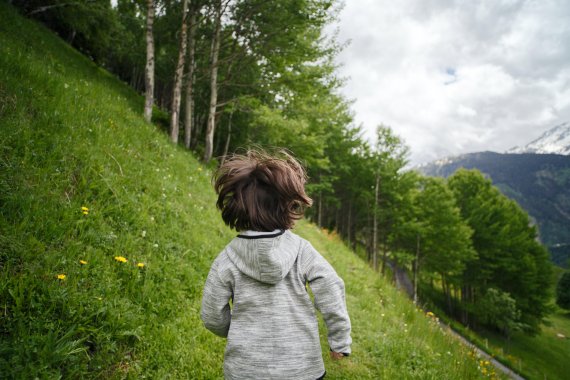 kid in a field